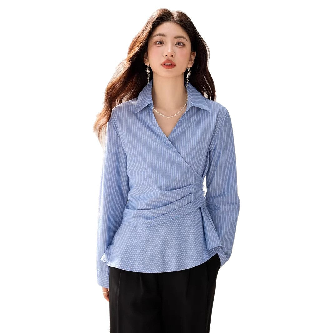 Spring blue and white striped long sleeved shirt for women with a cinched waist design, featuring a versatile layering and slimming style