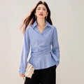 Spring blue and white striped long sleeved shirt for women with a cinched waist design, featuring a versatile layering and slimming style