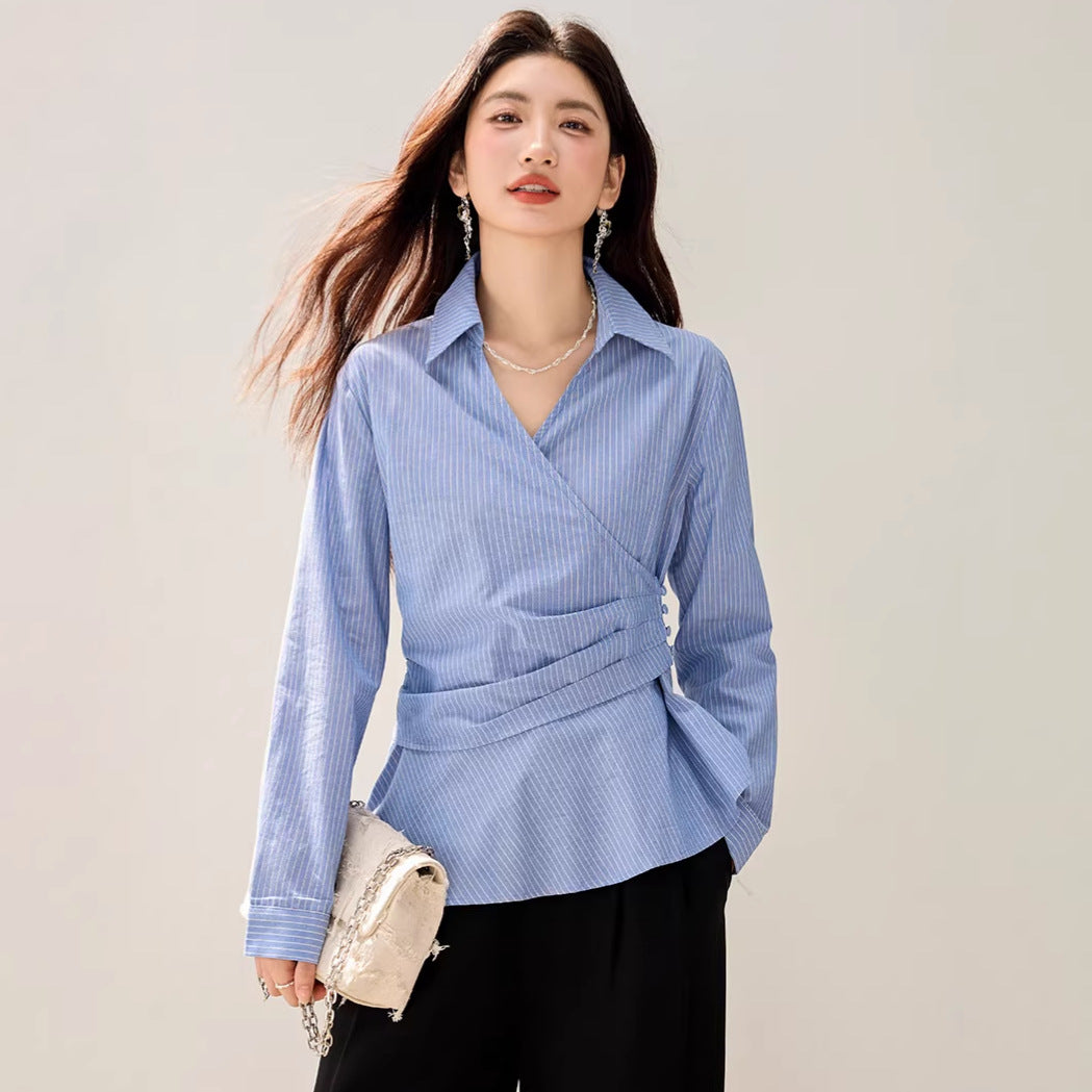 Spring blue and white striped long sleeved shirt for women with a cinched waist design, featuring a versatile layering and slimming style