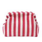 Striped women's handbag with vertical stripes and contrasting color shell bag