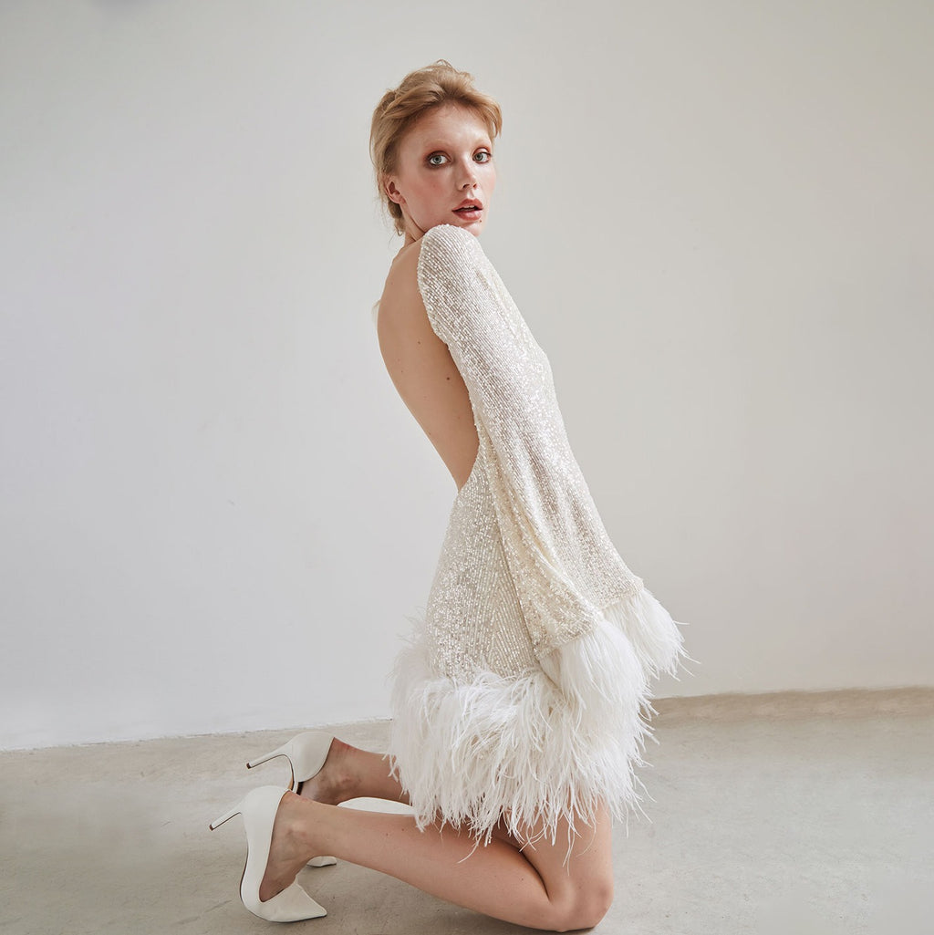 European and American waist length sexy short skirt dress with large backless long sleeved sequin feather dress