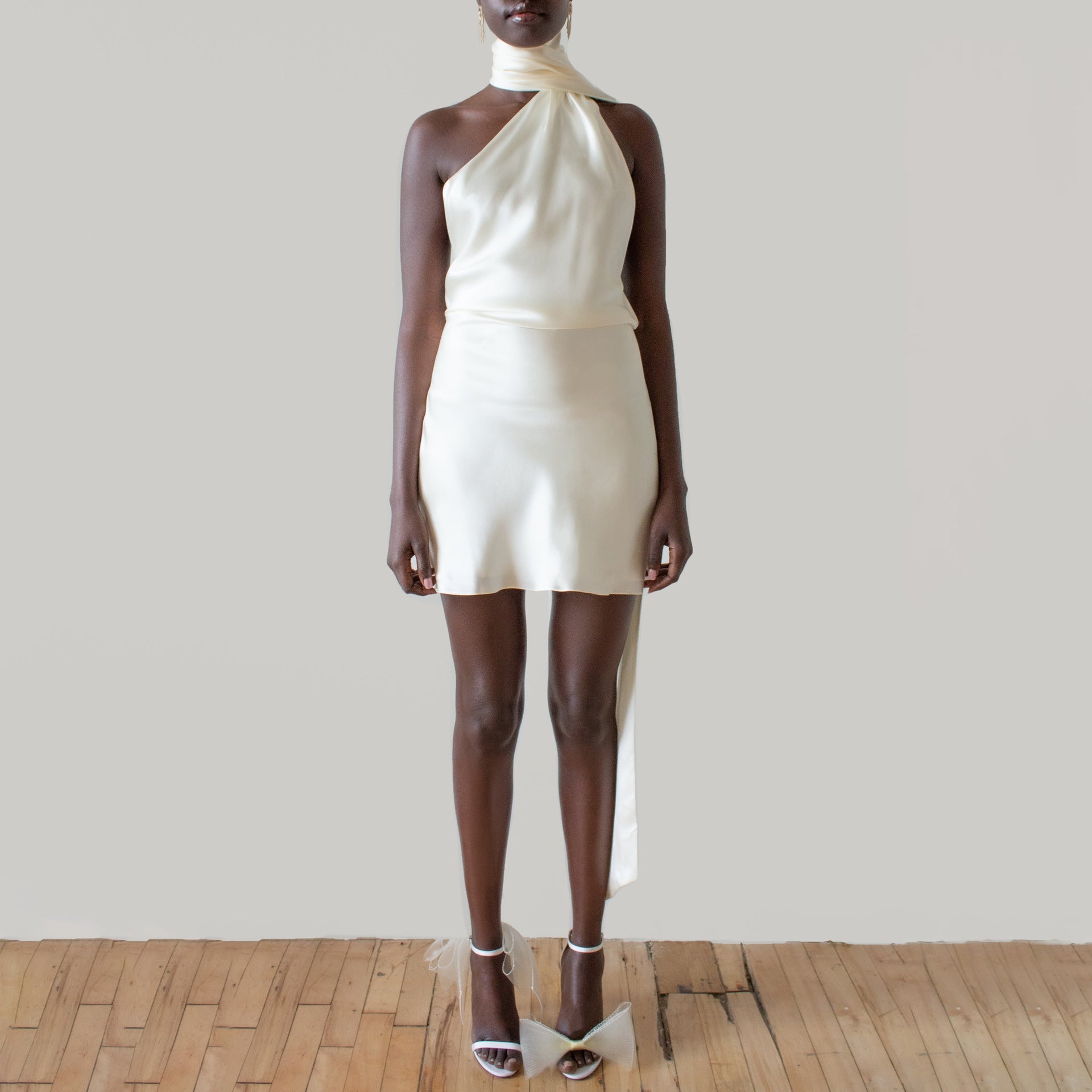 New dress with a feminine feel, featuring a backless short skirt and an adjustable neck hanging satin dress