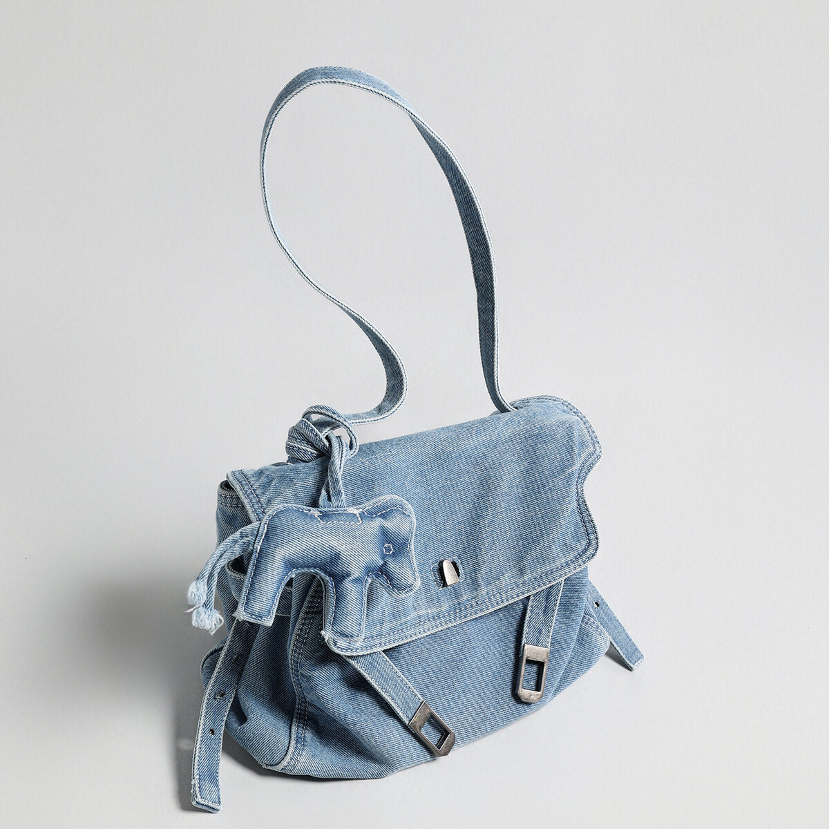 Distressed Denim Flap Crossbody – Elephant Charm Shoulder Bag with Buckle Details