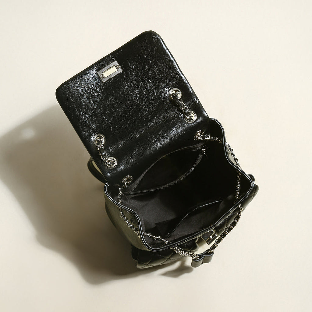 Multi-Pocket Chainstrap Quilted Backpack – Diamond-Quilted Leather Backpack with Silver Chain Straps & Turn-Lock Closure