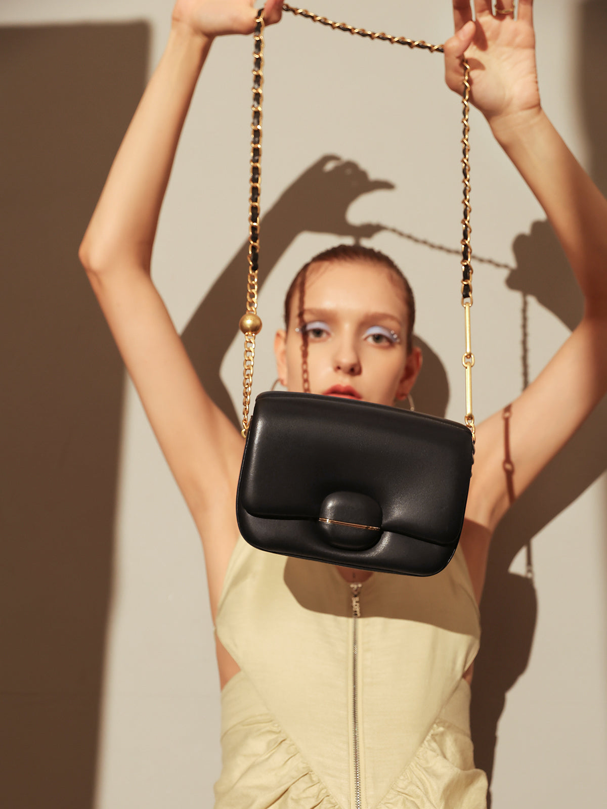 Structured Buckle Leather Shoulder Bag – Sculptural Lambskin Flap Bag with Gold Chain Strap
