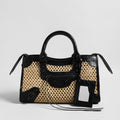 Studded Woven Straw Moto Bag – Edgy Leather Trim Crossbody with Dual Straps
