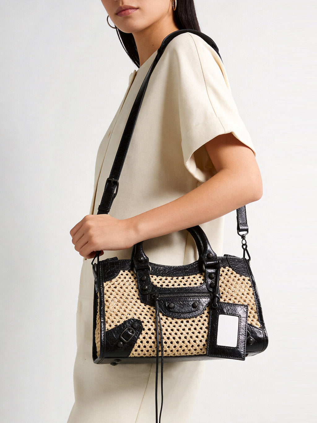 Studded Woven Straw Moto Bag – Edgy Leather Trim Crossbody with Dual Straps