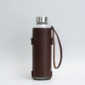 Leather water bottle holder with strap and glass bottle | OUTLET
